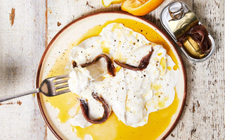 Discover a creamy burrata recipe featuring GOOD PHATS Organic Extra Virgin Olive Oil, anchovies, lemon zest, and a touch of sea salt for the perfect appetiser.