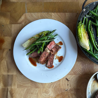 Steak and blistered greens